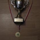 Puchar i medal za I miejsce w okręgówce.