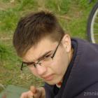 Kamil przyjmuje gratulacje od prezesa ZOM Zbigniewa Bedyńskiego.